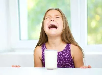 Girl crying over spilled milk